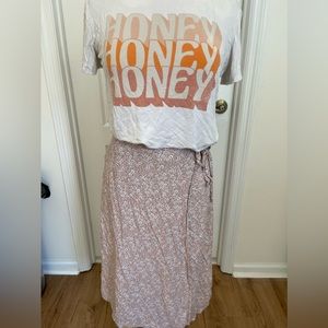 Woman’s skirt and tee shirt outfit